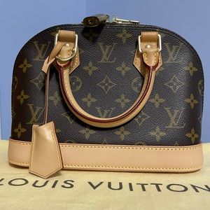 Louis Vuitton Alma BB in monogram.  New with inside tag, lock, keys + dust bag.